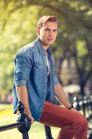 Portrait of young attractive man, outdoorsの写真素材