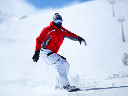 Snowboarder in action, winter sportの写真素材