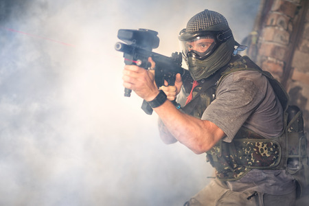 paintball shooters with paintball gunの写真素材