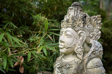Statues of Hindu god carvings in stone, Balinese mythological deitiesの写真素材