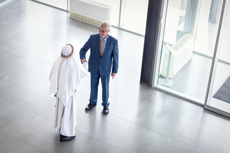 Manager of global company receive Arabian guestの写真素材