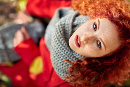 Top view of portrait nice curly girl in natureの写真素材