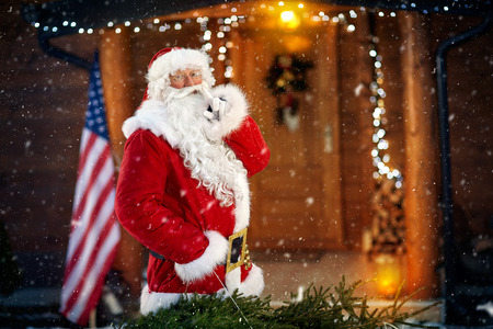 Surprise, Santa Claus arrives with the Christmas treeの写真素材