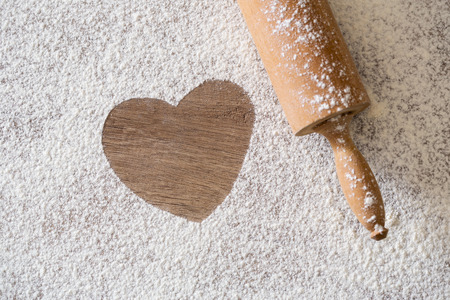 heart of the flour and rolling pin backgroundの写真素材