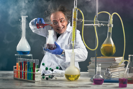 Crazy chemist doing experiment chemical laboratory