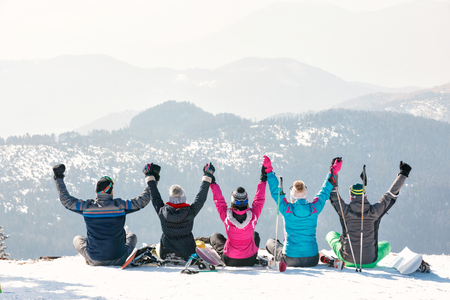 Group of friends enjoy at the top mountain of beautiful viewの写真素材