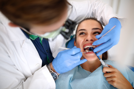 Young female patient on dental check upの写真素材