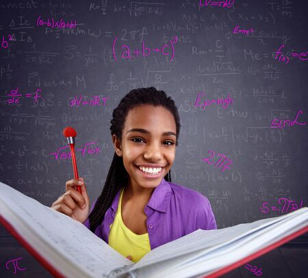 schoolgirl have a problem with mathematics formulas