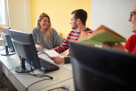 class with young students on computer on university academy