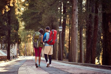 couple on vacation. Young man and woman in the mountains. Travel lifestyle adventure concept.
