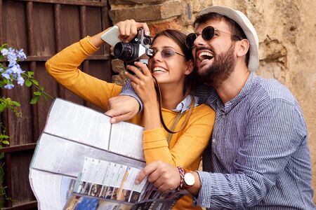 Happy Man and woman laughing at vacation  have fun and travel  togetherの写真素材