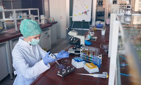 scientist in lab analysis of new corona virus, clinic laboratory chemical research of infection.