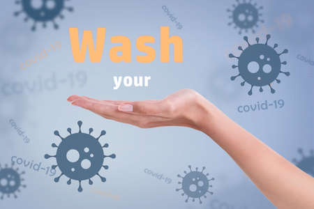 Wash your hand sign as protection from the global desease coronavirus. Prevention, spread, covid-19 concept backgroundの写真素材