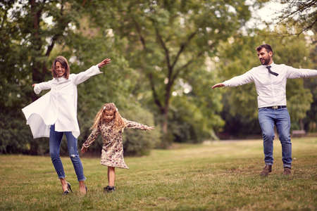 Family spending leisure time together in a parkの写真素材