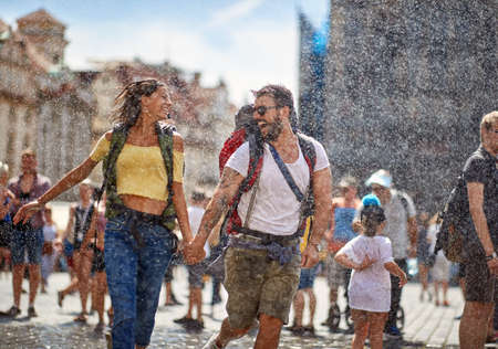 Romantic  raining day at summer  vacations.Happy  Couple traveling and enjoying  togetherの写真素材