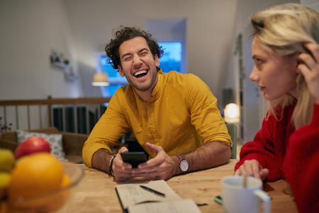 Joyful couple spending time together at home; Bonding couple concept