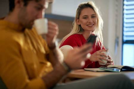 A young couple enjoying a morning routine in a relaxed atmosphere at the kitchen. Routine,...