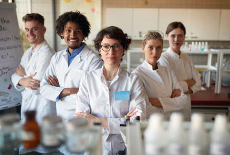 Group of young laboratory technicians in the lab