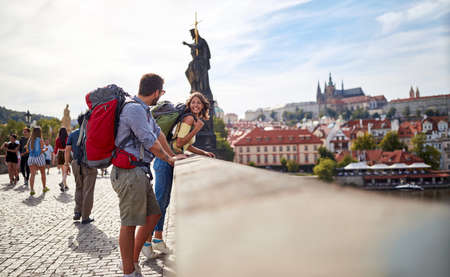 Tourist couple sightseeing in Prague; Traveller lifestyleの写真素材