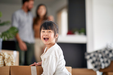 Portrait happy Japanese girl  in new apartmentの写真素材