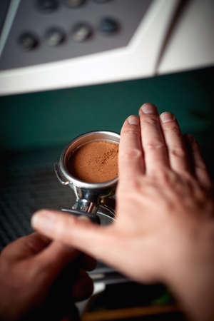 Barman's hands are making an aromatic and fragrant espresso. Coffee, beverage, barの写真素材