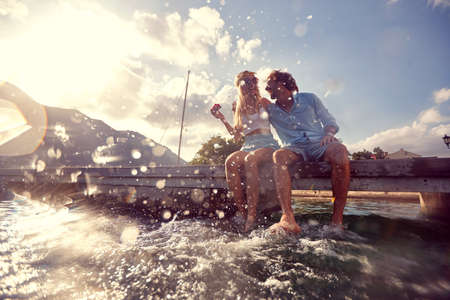 Happy  adventure at holiday.Smiling  young couple enjoying together at holidayの写真素材