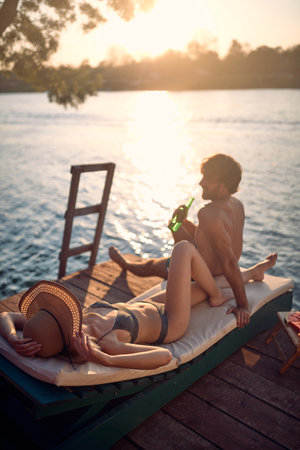 Romantic young man and woman relaxing.Couple on a vacation tripの写真素材