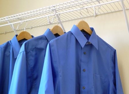 Three blue shirts の写真素材
