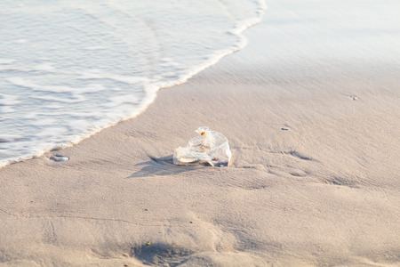 used plastic bag on the beachの写真素材