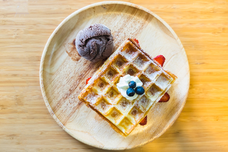 chocolate ice cream belgian waffles with blueberriesの写真素材