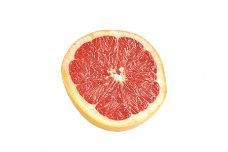 Half of grapefruit isolated over white.の写真素材