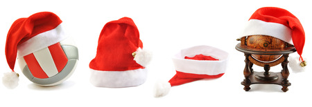 Collection of Santa's hats lined up on white. Christmas and New Year theme.の写真素材