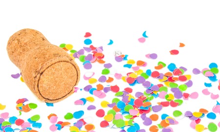 Champagne cork on confetti background. Holidays and events concept.の写真素材