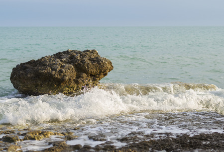 Stone and sea waterの写真素材