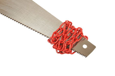 Saw tied with chain isolated on white 
