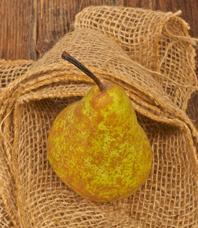 Pear fruit on a wooden tableの写真素材