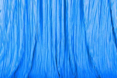 Blue crumpled fabric backgroundの写真素材