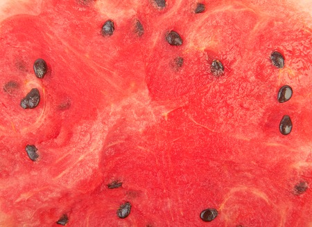 Half of ripe watermelon isolated on white backgroundの写真素材