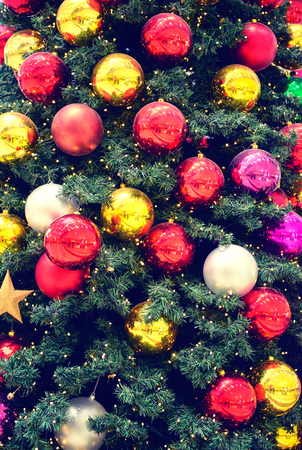 Xmas background Christmas tree with colorful balls if and lights, New yearの写真素材