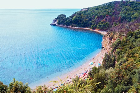 Beach on the Montenegrin coast, the bay in the Adriatic Sea, a top viewの写真素材
