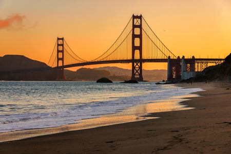 Sunrise at the beach near the Golden Gate Bridgeの写真素材