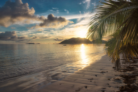 Sunrise on the tropical beach at Seychelles