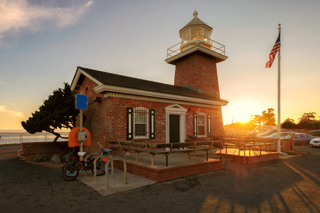 Sunset at Santa Cruz lighthouse museum a memorial to surfersのeditorial素材