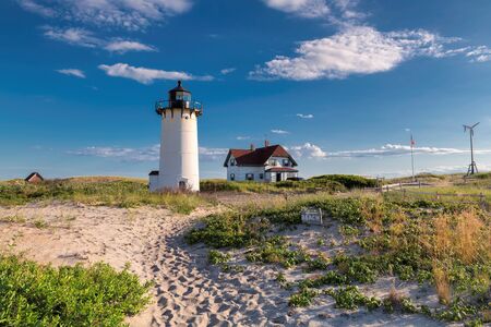 Lighthouse Point on beach dunes, Race Point Light Lighthouse in Cape Code, New England, Massachusetts, USA.の写真素材