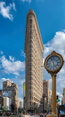 Flatiron building at the intersection of Broadway and Fifth Avenue. Completed in 1902, it is...