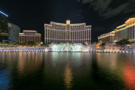 Bellagio hotel and casino at night in Las Vegas Strip in Las Vegas, USA. The Strip is home to the largest hotels and casinos in the world.のeditorial素材