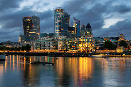 London City. Financial District of London UK at nightの写真素材