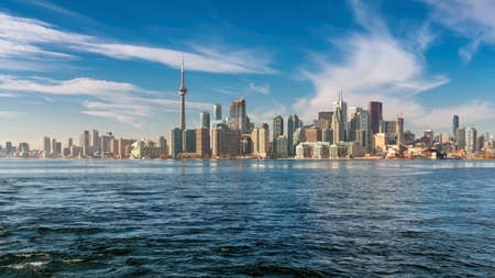 Toronto skyline with CN Tower over Ontario Lake, Toronto, Canada