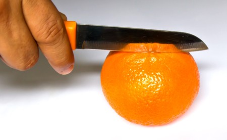 knife chop orangeの写真素材