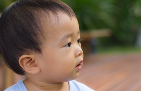 Happy asian baby boyの写真素材